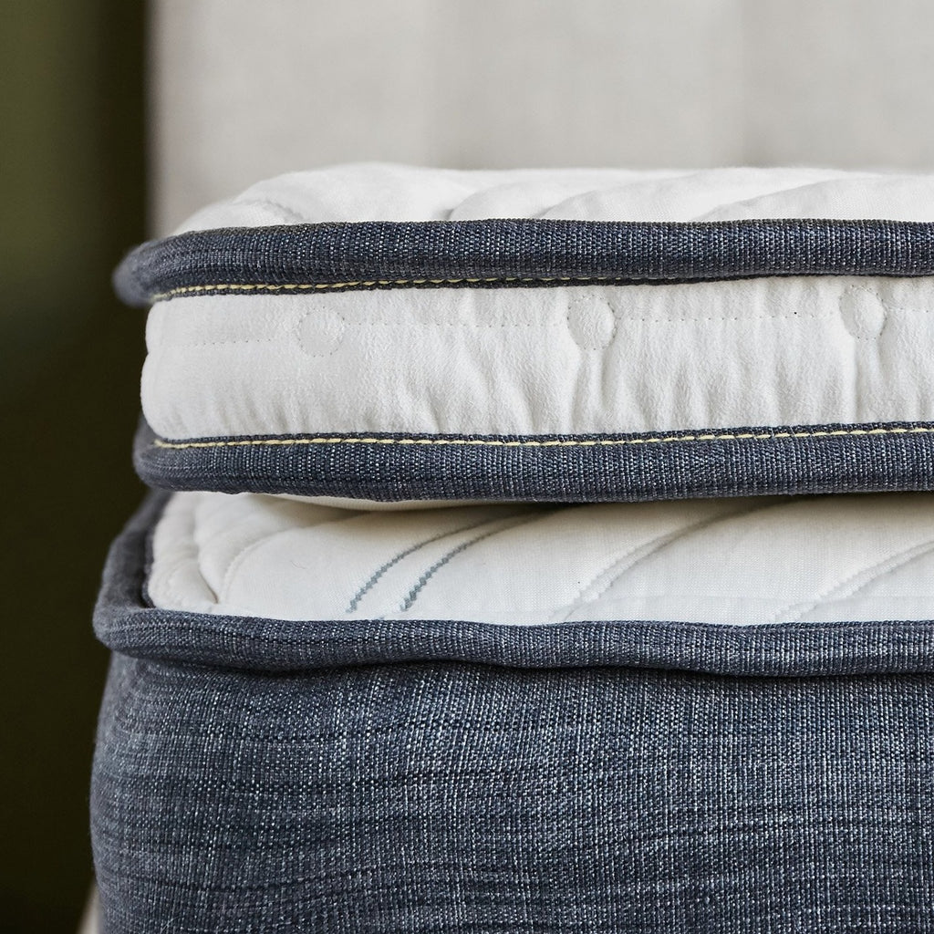 Memory foam mattress topper on top of a natural mattress made by Brentwood Home